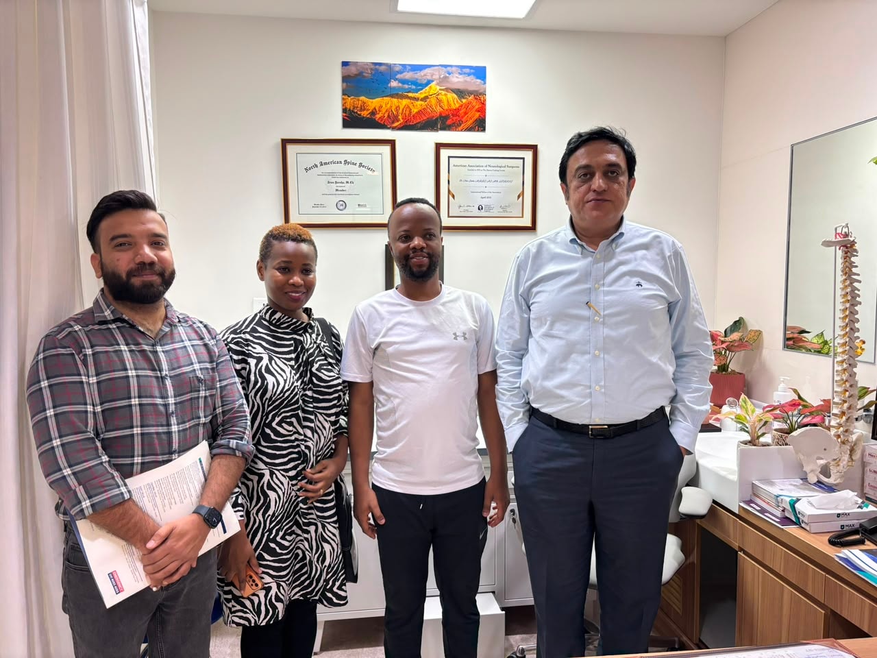 Mr. John from Tanzania with Dr. Arun Saroha and family at Max Hospital Dwarka after successful brain tumour removal surgery