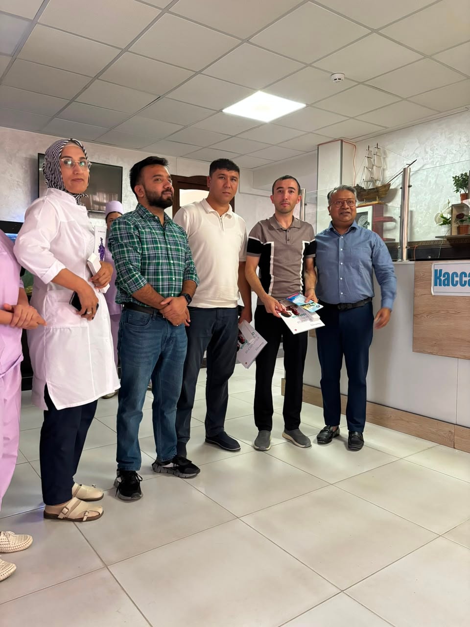 Wiseheal Healthcare team with local clinic staff at Kassa clinic OPD camp in Uzbekistan