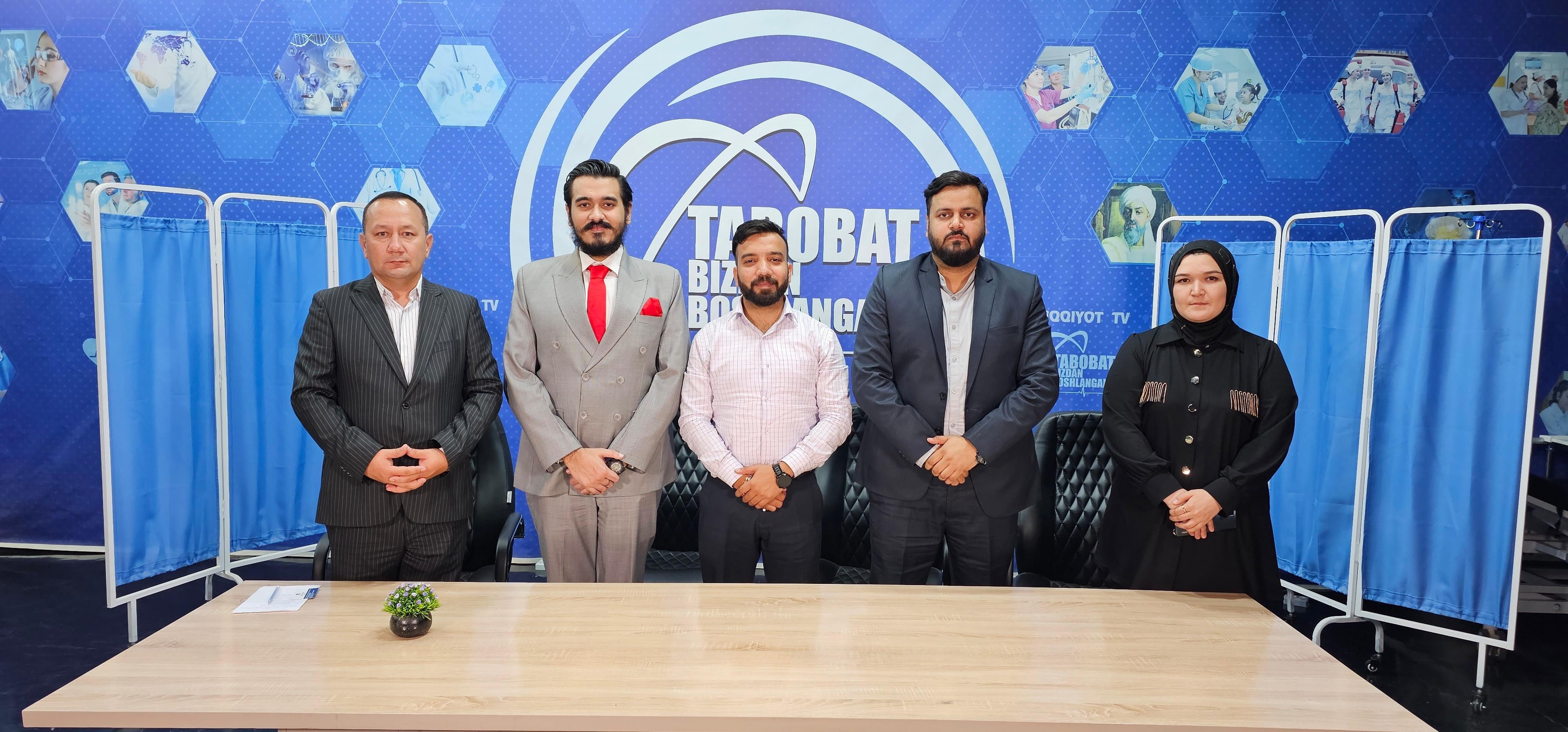 Wiseheal Healthcare director and Dr. Jitesh Mangwani at Tarobat TV studio, Uzbekistan — live television interview and online patient consultations