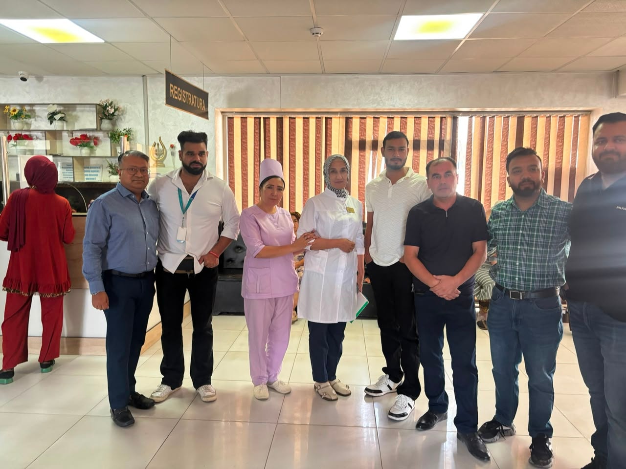 Wiseheal Healthcare team with hospital staff at Registratura — Uzbekistan hospital visit